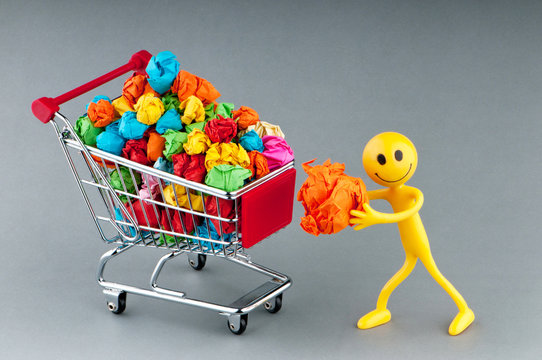 Recylcing concept with color paper and shopping cart