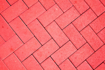 pavement pattern made with cast concrete blocks in red color
