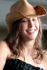 Beautiful woman with cowboy hat