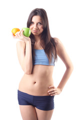 Young woman hold apple and orange. Isolated