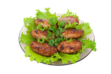 Cutlets on salad leaves