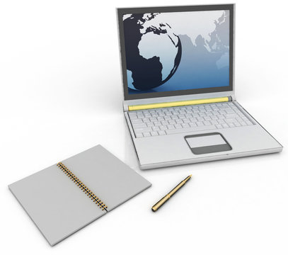 laptop with a notebook and pen