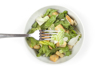 A green salad with croutons and cheese
