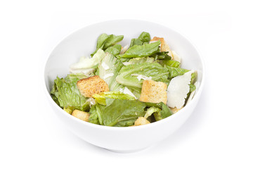 A green salad with croutons and cheese
