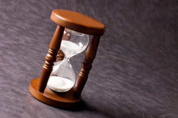 Hourglasses on a grey background