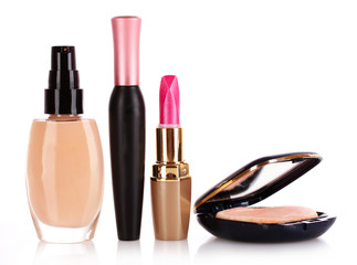 foundation, mascara, lipstick and powder isolated on white