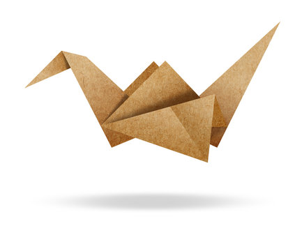 Origami Bird From Brown Paper Cardboard On White Background