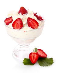 Many strawberries in glass with cream isolated on white