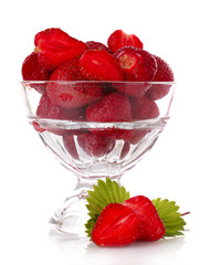 Many strawberries in glass isolated on white