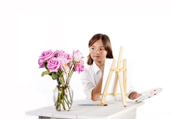 Painting flowers in a vase.