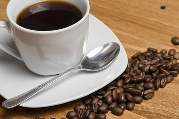 black coffee cup on wooden table