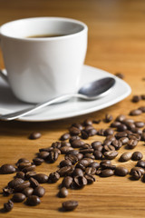 black coffee cup on wooden table