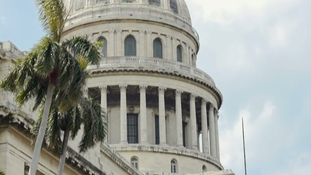 female tourist taking photos in Cuba