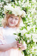 little girl with flowers