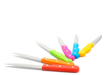 colored knifes on white background