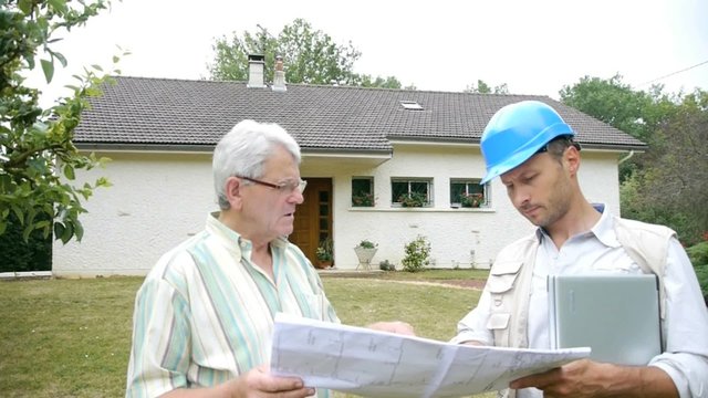 Architect meeting private individual at home