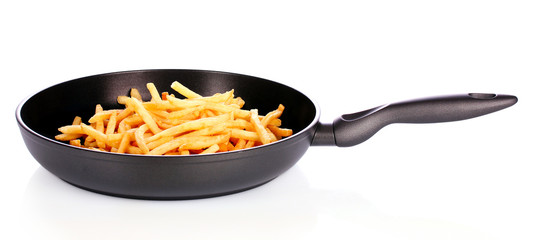 French fries in the pan isolated on white