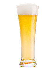 Beer into glass isolated on white