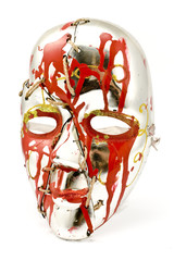 Broken and repaired carnival mask