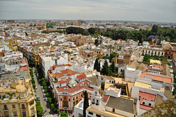 Panorama of the beautiful old centre of Seville Andalucia Spain showing several famous sites taken from the bell tower of it’s amazing cathedral	