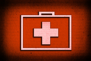 Fototapeta premium Suitcase for healing symbol on red paper background