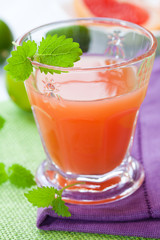 Glass of pink grapefruit with lemon mint