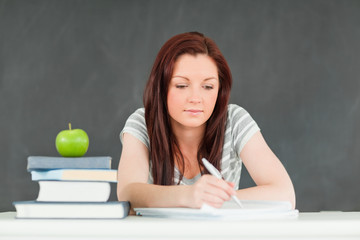 Young student taking notes