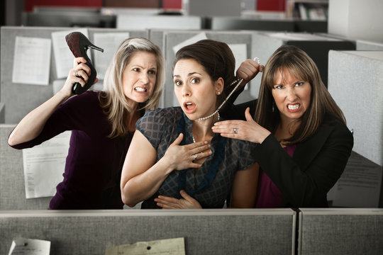 Three Women Quarreling In Office