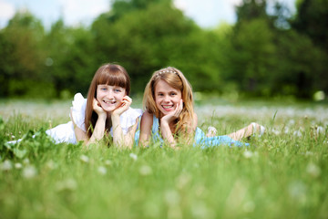 Fototapeta premium two girls playing in the park