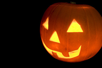 Halloween Pumpkin Head Carved Jack O Lantern, Cut Out on Black