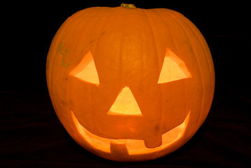 Halloween Pumpkin Head Carved Jack O Lantern, Cut Out on Black