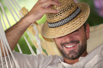 portrait of a man in a hammock