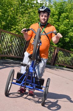 down syndrome man with tricycle