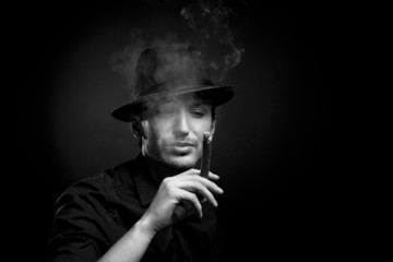 Man with hat and cigar in Black
