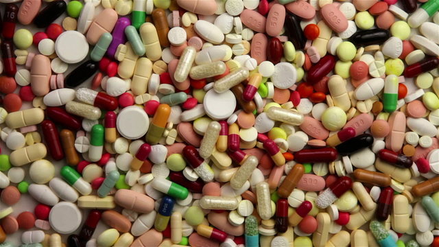 Loop of many pills spinning