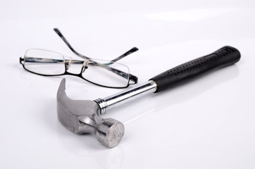 Hammer and eye glasses
