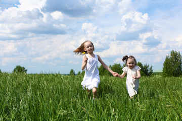 two little sisters outdoors