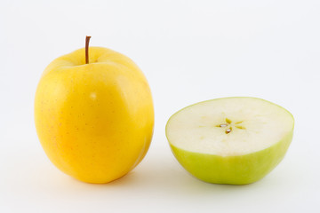 The yellow and green juicy fresh apples and slices