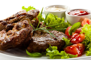 Grilled steaks and vegetables