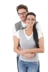 Fototapeta premium Happy young couple hugging each other