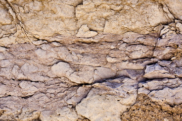worn textured stone wall