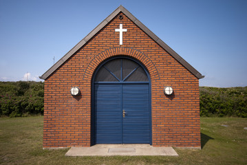 Blue door and white cross
