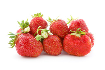 pile of fresh strawberries isolated on white.