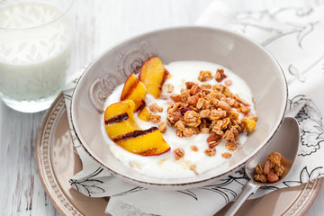 muesli,yogurt and grilled peaches