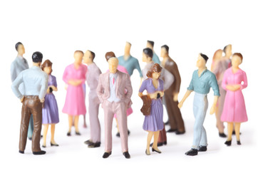 toy people stand in different poses isolated