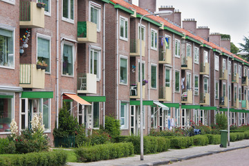 Typical Dutch residential street with flats