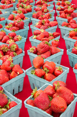 Strawberries in baskets on display