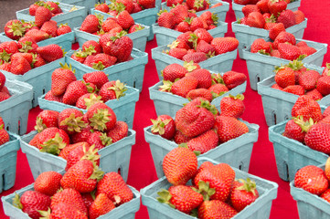 Strawberries in baskets on display