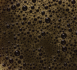 close up of black coffee bubbles