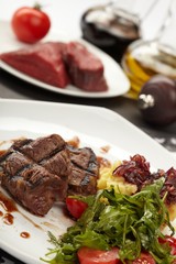 Beef steaks with vegetables